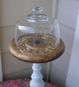 I popped one of the weights onto the top of an upcycled wood lamp base and my smallest cloche on top - perfect fit.